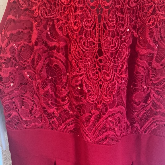 Large red dress. Sequin detail on top. Runs more like a medium in my opinion. - Picture 2 of 3